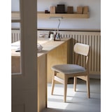 thumbnail of Sedia in legno massello, schienale in canna e seduta in tessuto grigio screziato