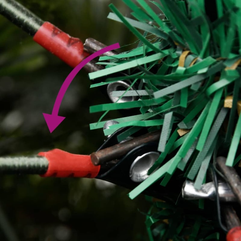 Ein rotes Klebeband verbindet zwei Kabel.