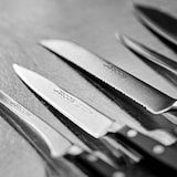 thumbnail of Arcos Cuchillo Rocking Santoku Cuchillo Asiático, Hoja Acero Inoxidable Forjado NITRUM 170 mm, Mango Polioximetileno (POM), Color Negro (Filo Seda)