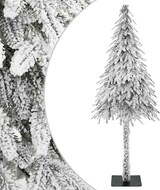Ein verschneiter künstlicher Weihnachtsbaum mit Ständer.