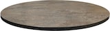 Un plateau de table rond aspect pierre.