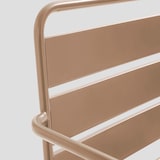 thumbnail of Poltrona bassa da giardino in metallo color taupe.