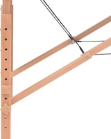 Ein Teil eines Massagetisches aus Holz.