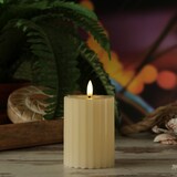 thumbnail of LED Kerze Liv Echtwachs gerillt geriffelt flackernd H:12cm Timer creme