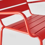 thumbnail of Rode metalen fauteuil en voetensteun