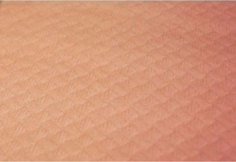 Schachtel mit 400 Papierschnitt-Tischdecken 100x100 Lachsfarbe