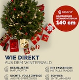 Ein künstlicher Weihnachtsbaum mit Zubehör.