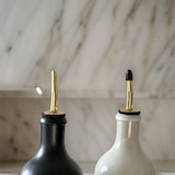 thumbnail of Schenktuiten voor flessen van roestvrij staal in goud - set van 3