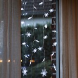 thumbnail of LED Lichtervorhang Schneeflocken 64 kaltweiße LED 1,2mx1m für Innen Weihnachten