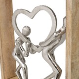 thumbnail of Dekofigur Holding Hearts 34,5 cm aus Mangoholz und Aluminium Skulptur im Holzrahmen mit zwei Personen und Herz Symbol für Liebe und Zusammenhalt