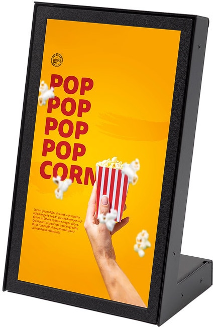 Ein beleuchteter Ständer mit einem Filmplakat.