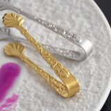 thumbnail of Pince à sucre dorée