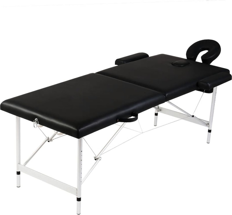 Ein schwarzer Massagetisch mit verstellbarem Kopfteil.