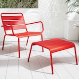 thumbnail of Rode metalen fauteuil en voetensteun
