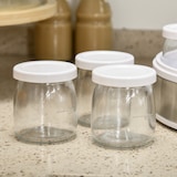 thumbnail of HOMCOM Iogurteira 20W Capacidade 1,26L com 7 Frascos de Cristal de 180 ml Termóstato Ajustável Temporizador de 1-48 horas 24x24x13 cm Branco