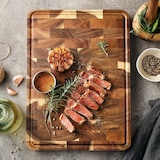 thumbnail of XinZuo - Tabla de cortar de madera de acacia con pies y ranura antideslizantes