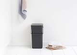 thumbnail of Brabantia Abfallsammler mit Stay-open Deckel | 16 Liter, HxBxT 40x27,9x22cm | Kunststoff | Dunkelgrau