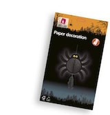 Eine Papierdekoration in Spinnenform.