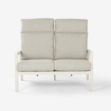 thumbnail of Sofá exterior de 2 lugares com estrutura em alumínio off-white e almofadas cinzentas.