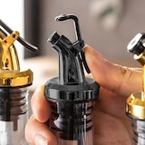 thumbnail of Vertedor para botellas negro con tapón de plástico en juego de 10