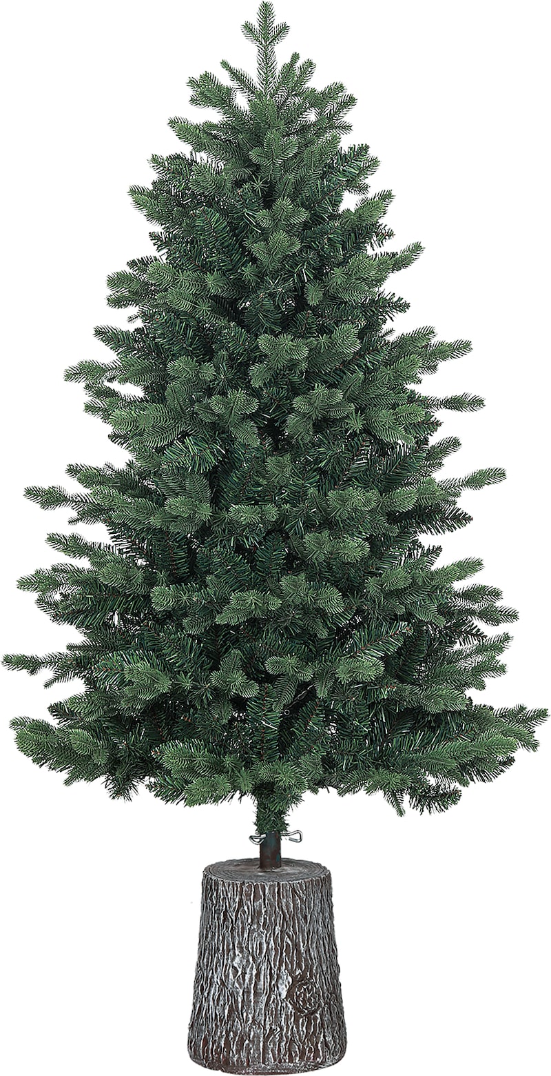 Un albero di Natale artificiale in un supporto per albero.