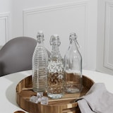 thumbnail of Botella de vidrio con tapa abatible de 1 litro – Botella de agua transparente con tapa abatible – Transparente