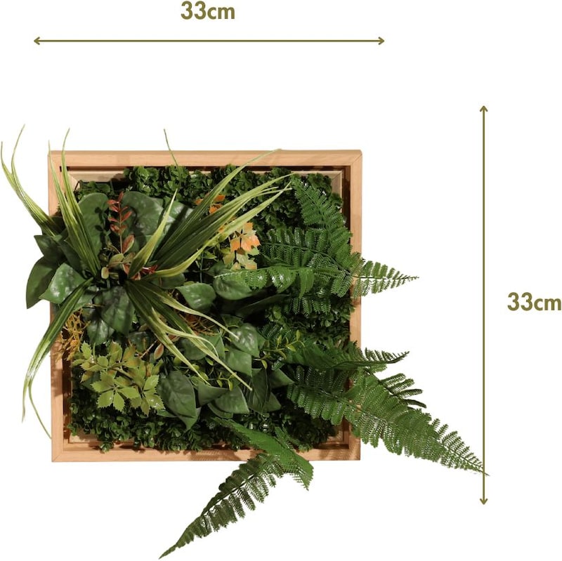 Un marco de plantas artificiales con helechos y hojas.