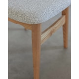 thumbnail of Sedia in legno massello, schienale in canna e seduta in tessuto grigio screziato