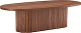 Une table ovale en bois avec des éléments verticaux en bois.