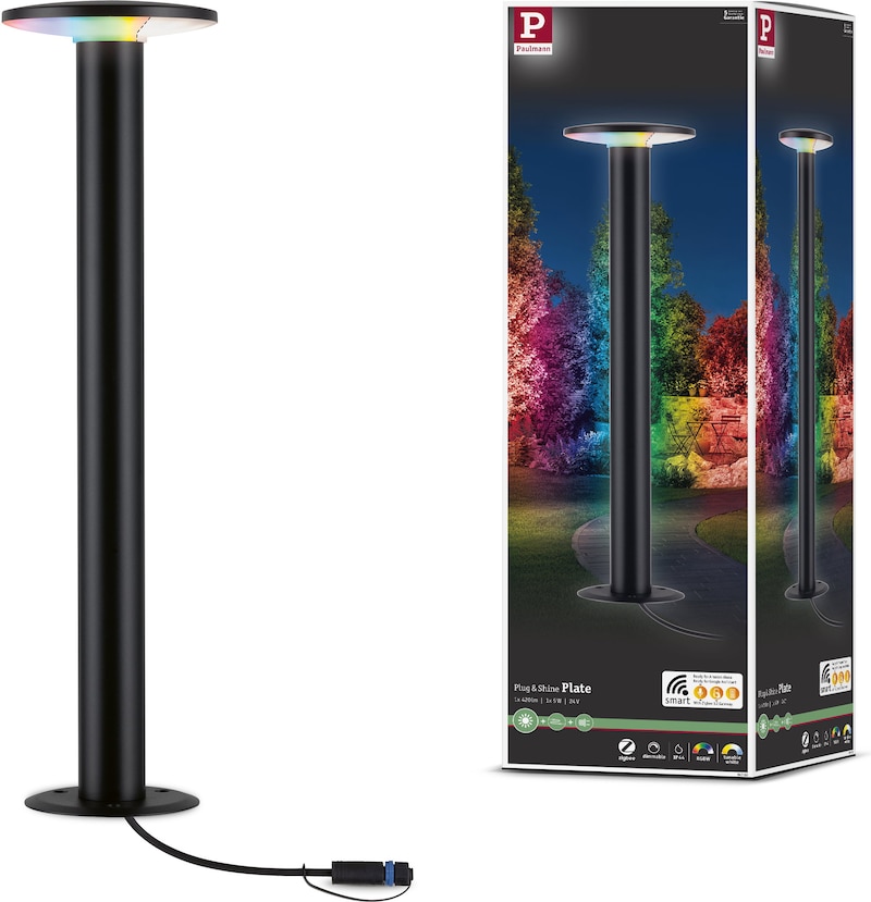 Eine schwarze Stehlampe mit farbigem Licht.