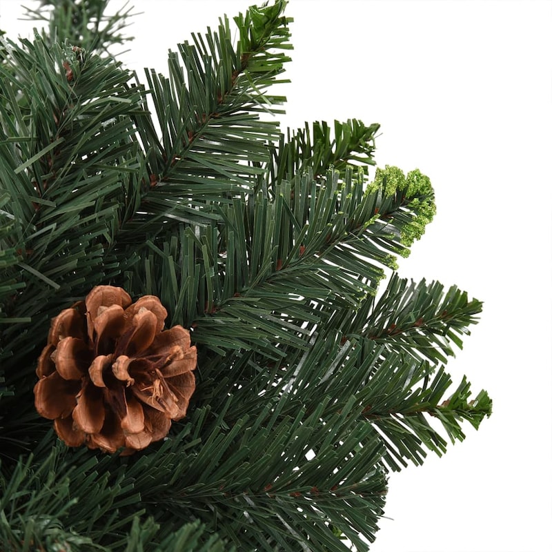 Eine Nahaufnahme eines künstlichen Weihnachtsbaums mit Zapfen.