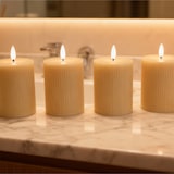 thumbnail of Relaxdays LED Kerzen, 4er Set, HxD: 13 x 7,5 cm, flackernde Flamme, Echtwachs, Rillen, flammenlose Blockkerzen, beige