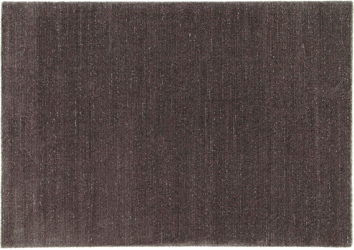 Una alfombra rectangular de color gris oscuro.