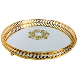 thumbnail of Plateau rond en acier doré avec fond miroir de style oriental